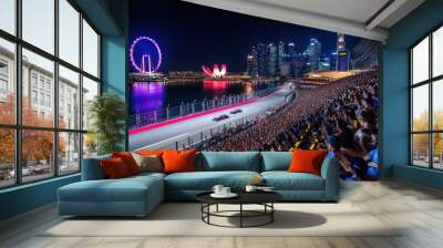 Panoramic image of vibrant nighttime scene of a Formula 1 race in a city setting. Tribune of spectators watching race event Wall mural