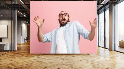 portrait of the scared man on pink Wall mural