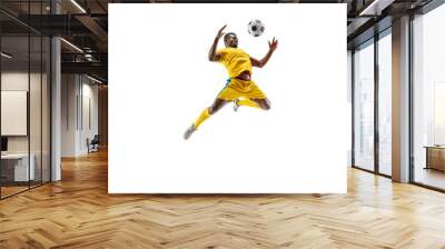 Professional african american football soccer player in motion isolated on white studio background. Fit jumping man in action, jump, movement at game. Wall mural