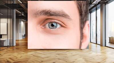 The conceptual image of digital eye of a young man and eoman Wall mural