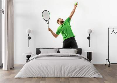 The one caucasian man playing tennis isolated on white background. Studio shot of fit young player at studio in motion or movement during sport game.. Wall mural