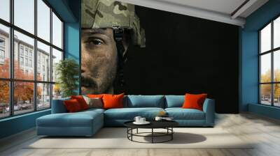 There's only one half of life. Close up portrait of young male soldier. Man in military uniform on the war. Depressed and having problems with mental health and emotions, PTSD, rehabilitation. Wall mural