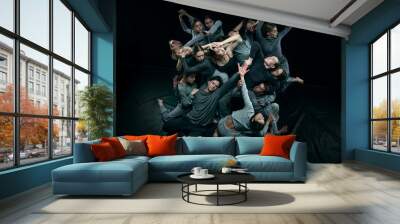 Top views of group of young people dancing contemp style against black studio background. Unique. Concept of modern freestyle dance, contemporary art, movements, hobby and creative lifestyle Wall mural