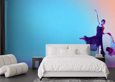 Tradition meets modernity. Young girl, ballerina dancing with man, break dance, hip hop performer against gradient background in neon light. Concept of classical and modern dance, performance Wall mural