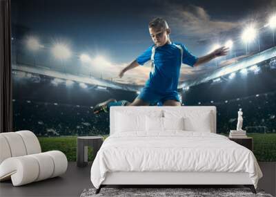 Young boy with soccer ball doing flying kick at stadium. football soccer players in motion on green grass background. Fit jumping boy in action, jump, movement at game. Collage Wall mural