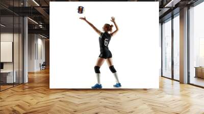 Young female volleyball player isolated on white studio background. Woman in sport's equipment and shoes or sneakers training and practicing. Concept of sport, healthy lifestyle, motion and movement. Wall mural