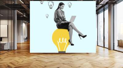 Young girl, accountant, finance analyst or clerk in office suit using laptop isolated on light background. Wall mural