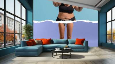 Young plus-size woman with body, legs og slim girl in weight loss process isolated on blue-purple background. Weight loss, fitness, healthy eating, motivation concept. Wall mural