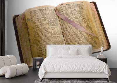 Old antique vintage open bible isolated with cliping path. Wall mural