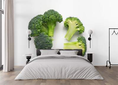 Isolated Broccoli. Green vegetables on white background. Top view. Wall mural