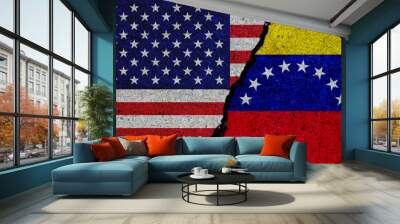 concrete wall with painted united states and venezuela flags Wall mural