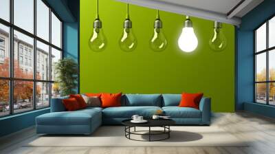 One hanging light bulb glowing different and standing out from unlit incandescent bulbs with reflection on green background , leadership and different business creative idea concept. 3D rendering. Wall mural