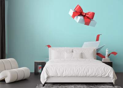 Open present box or gift box with red ribbons and bow isolated on green blue pastel color background with shadow 3D rendering Wall mural