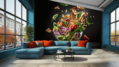 Splash of vegetable salad with flying ingredients on black background. Mixed media. created with generative AI Wall mural