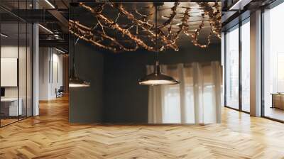 a three lights hanging from the ceiling in a room Wall mural