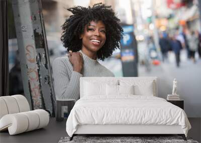 Beautiful African American Woman with black, curly hair Wall mural