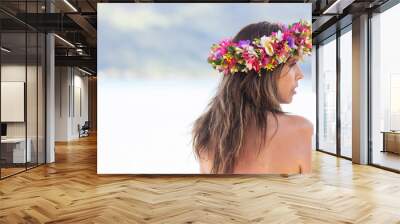 Beautiful woman wears colorful Tahiti flower crown Wall mural