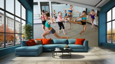 Group of ballet dancers having fun in studio Wall mural