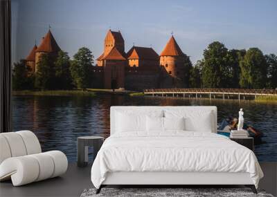 Boat on a river in a town Wall mural