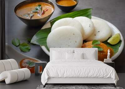 South Indian breakfast Idli, sambar and chutney served in banana leaf Wall mural