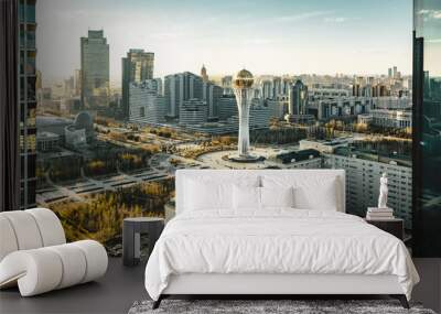 Sunset view towards Bayterek tower and hous of ministries in Astana Kazakhstan on a clear day Wall mural