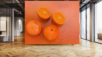 fruit oranges on a orange skin Wall mural