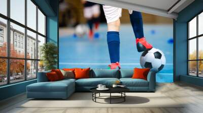 Indoor futsal soccer players playing futsal match. Indoor soccer sports hall. Futsal players kicking match. Futsal training dribbling drill. Sports background. Futsal league. Wall mural