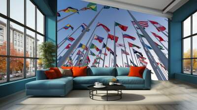 Flags of the different countries against the blue sky Wall mural