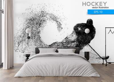 silhouette of a hockey player from particles. Wall mural