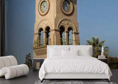 Daytime view of a historic public clock tower in downtown Bakersfield, California, USA. Wall mural