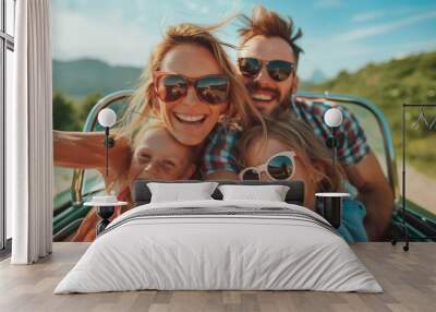 A family smiles for a photo during a summer road trip Wall mural