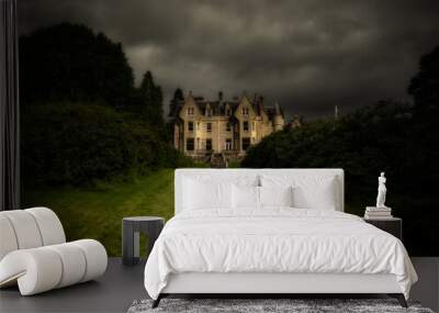 Old mansion in England on a cloudy day Wall mural