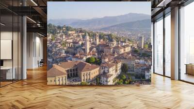 Drone aerial view of Bergamo - Old city. One of the beautiful city in Italy. Landscape on the city center, its historical buildings and towers during a wonderful blu day Wall mural