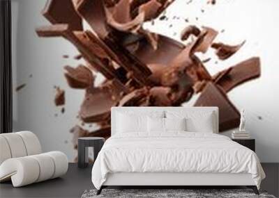 chocolate pieces and splinter flying, isolated on white Wall mural