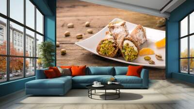 Sicilian cannoli stuffed with ricotta cheese and pistachio, traditional Sicilian dessert, Italian pastry Wall mural