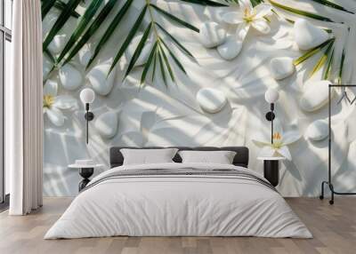 Beautiful spa background featuring white stones, lily flowers, and sun shadows on a transparent, clean white water surface with palm leaves. Wall mural