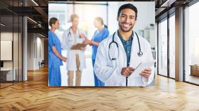 Medical, doctor and tablet with portrait of man in hospital for digital report, networking and expert research. Medicine, healthcare and app with male physician for technology, results and internet Wall mural