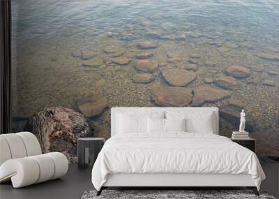 Clear water with stones Wall mural