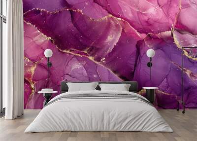 Magenta alcohol ink swirls on a minimalist purple marble background accented with golden cracks Wall mural