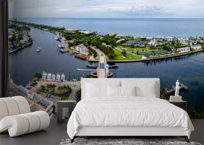 aerial drone shot of Hillsboro Inlet, Florida with bridge in city Wall mural