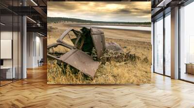 Wrecked antique car on lake shore 2 Wall mural