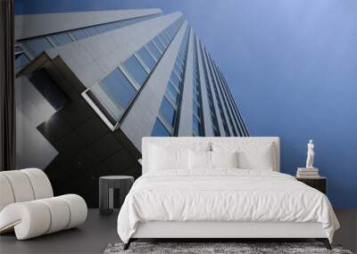 modern office building with blue sky and clouds Wall mural