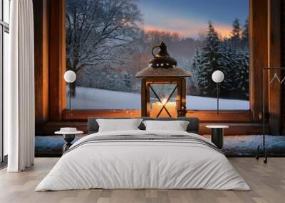 A rustic candle lantern sitting on a snowy windowsill Wall mural