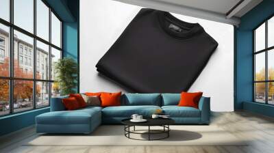 Black t-shirt mockup neatly folded, side view, isolated on white Wall mural