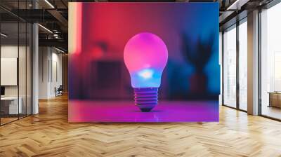 Smart light bulb changing colors via smartphone app Wall mural