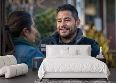 Hispanic man talking to woman in front yard, service provider, lawn care, arborist, landscaper, delivery man, couple, home Wall mural