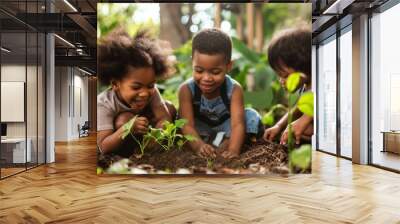 Young children playing in the dirt learning to grow in a garden, diverse brown black latino children planting seedlings in a veggie patch Wall mural