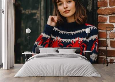 Young woman wearing a cozy warm sweater with lobster print Wall mural