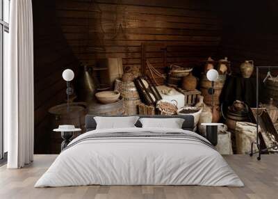 Interior cargo bay area of a wooden historical ship with barrels and ropes, Nao Victoria replica Wall mural