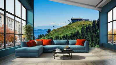 Panoramic view from Dreilandereck Austria, Slovenia, Italy, Carinthia, with ski lift buildings during summer Wall mural